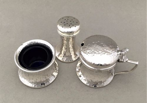 fig 2. A Silver Arts and Crafts three piece cruet