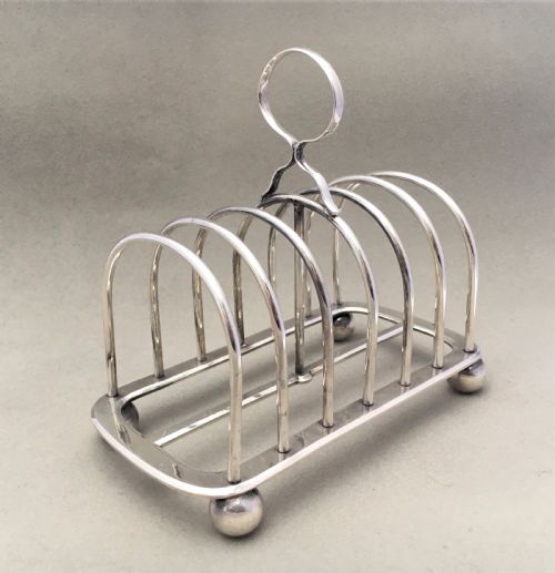 fig 1. An Edwardian six slice silver toast rack