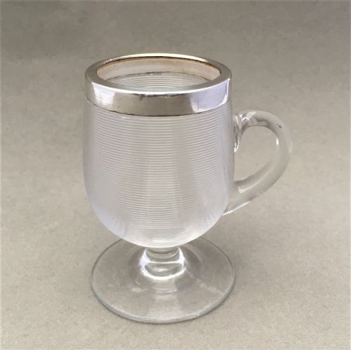 fig 1. A rare novelty silver mounted match striker