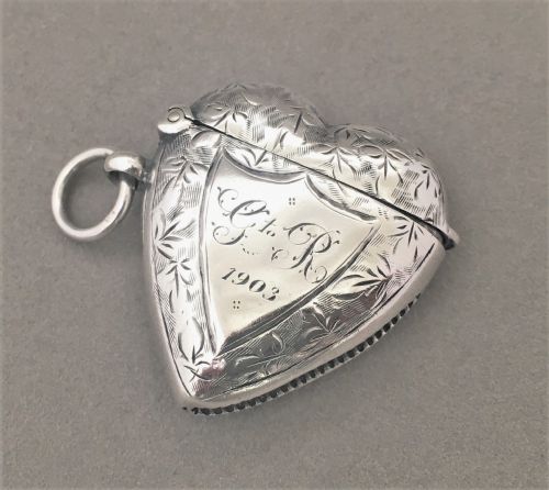 fig 1. A Rare & unusual heart shaped silver vesta