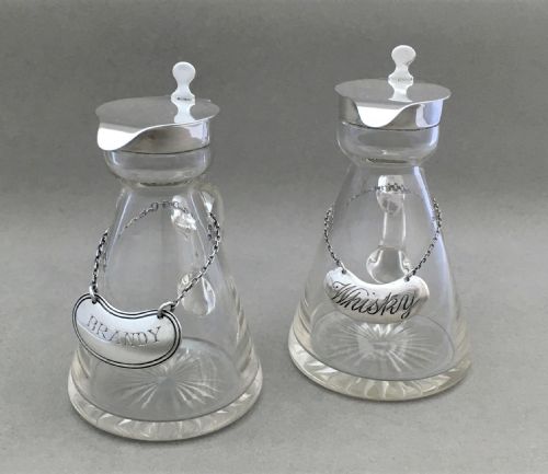 fig 1. A pair of silver mounted Brandy & Whisky Noggins