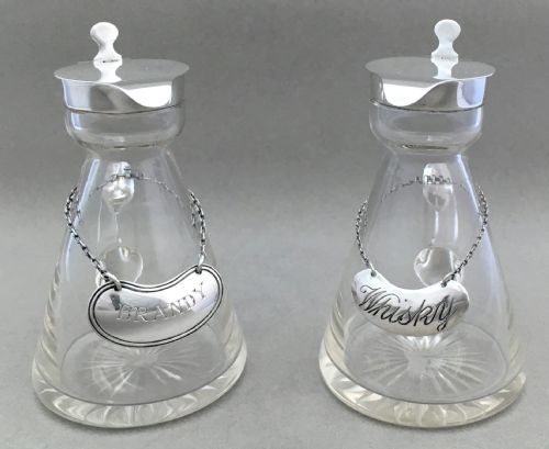 A Pair of Silver Mounted Brandy & Whisky Noggins