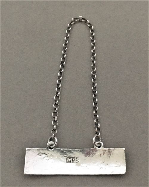 fig 1. A Rare 18th Century silver Mountain label - Female silversmith