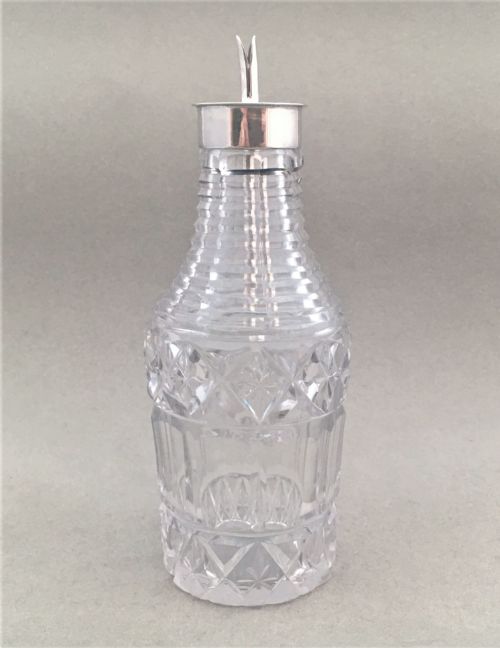 A Silver Mounted Bitters Jigger
