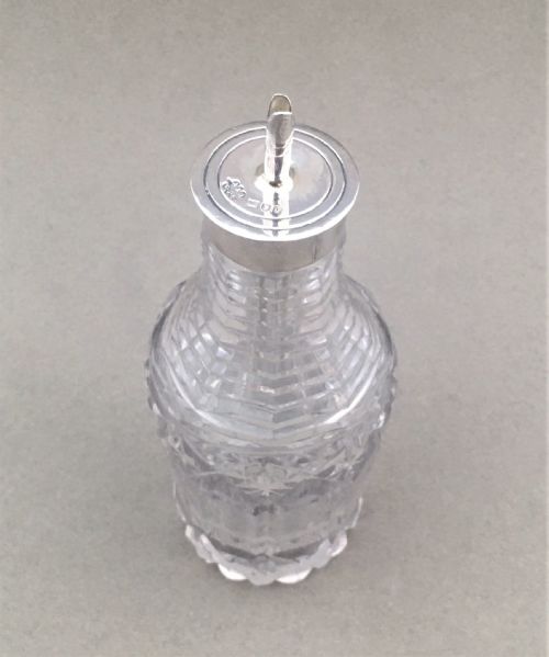 fig 1. A silver mounted bitters jigger