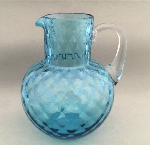 A Turquoise Blue Honeycomb Water Jug
