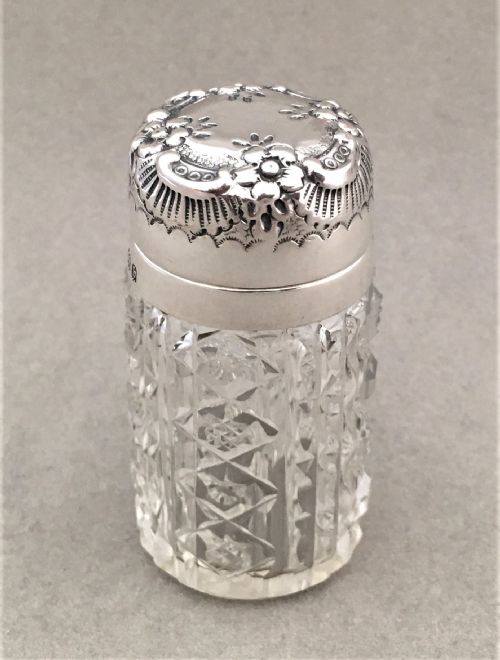 A Charming Silver Mounted Cut Glass Scent Bottle
