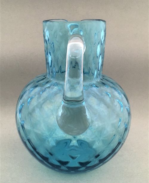 fig 1. A turquoise blue honeycomb water jug