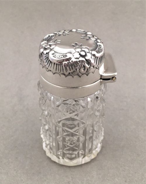 fig 1. A charming silver mounted cut glass scent bottle