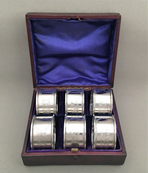A Rare Set of Six Boxed Silver Napkin Rings