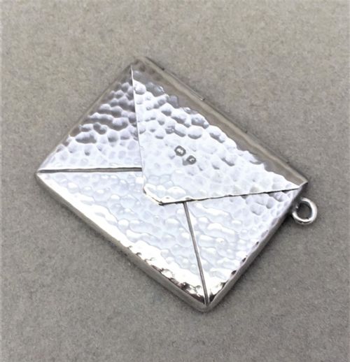 A Lovely Arts & Crafts Silver Stamp Case