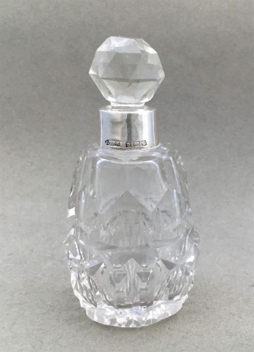 A Charming Silver Mounted Cut Glass Scent Bottle