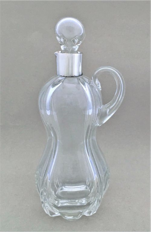 fig 1. A charming silver mounted olive oil or vinegar bottle