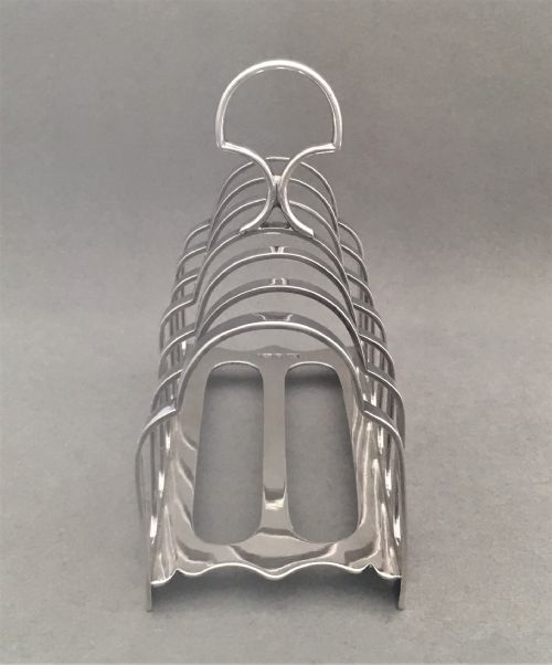 fig 1. A Victorian six slice silver toast rack