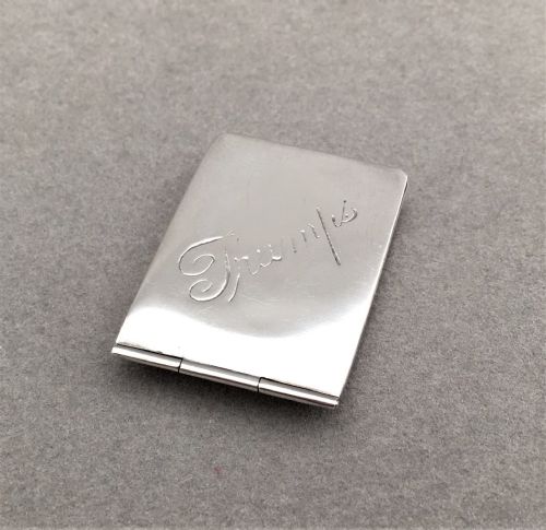 fig 1. A delightful silver trump marker