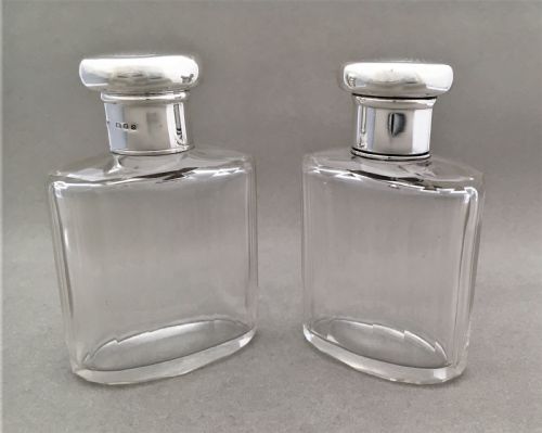 fig 1. A charming pair of silver mounted cologne bottles