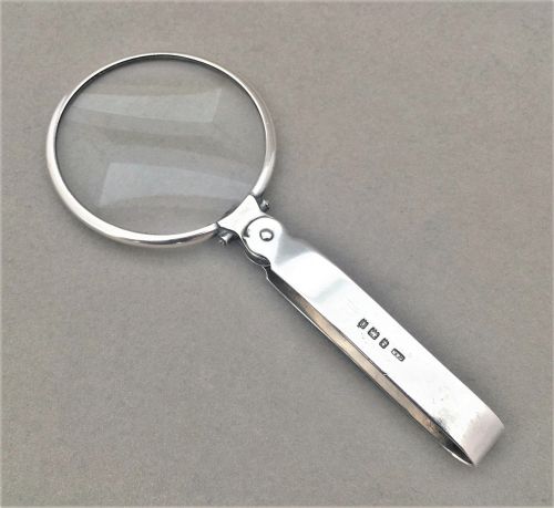 An Unusual Silver Folding Magnifying Glass