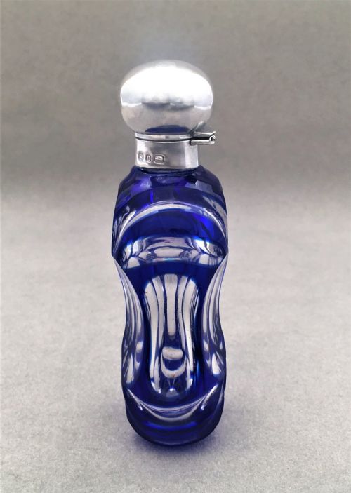 fig 1. A Victorian silver mounted cut through scent bottle