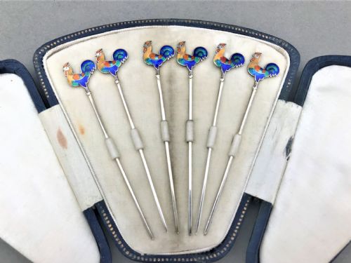 fig 1. A delightful boxed set of silver & enamel cockerel cocktail sticks