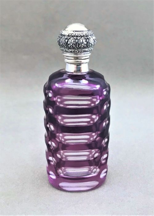 A Gorgeous Silver Mounted Cut Through Amethyst Scent Bottle