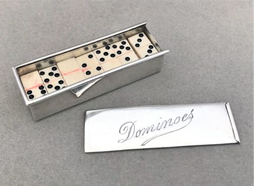 An Extremely Rare Silver Cased Set of Dominoes