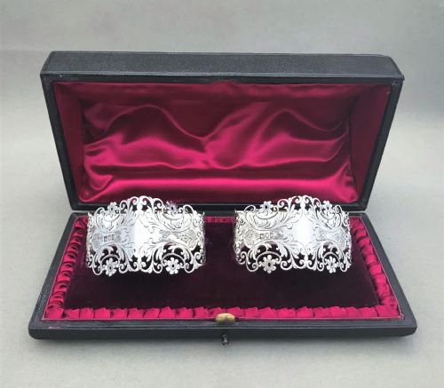 An Exquisite Boxed Pair of Silver Napkin Rings