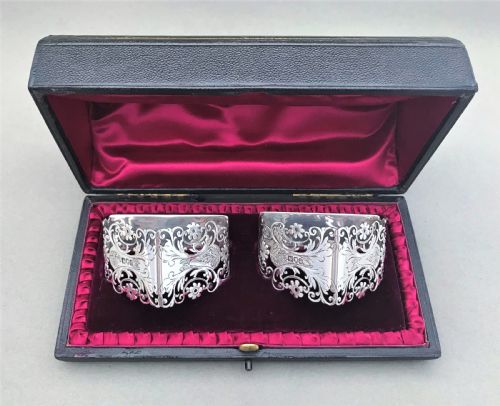 fig 1. An exquisite boxed pair of silver napkin rings