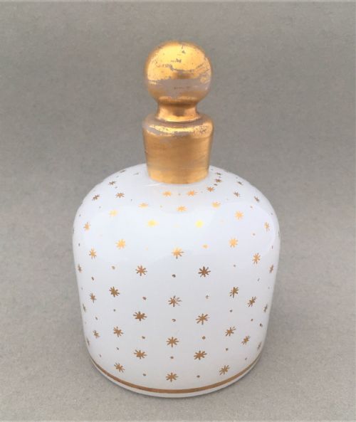 A Fabulous Star Gilded Opaline Glass Cologne Bottle