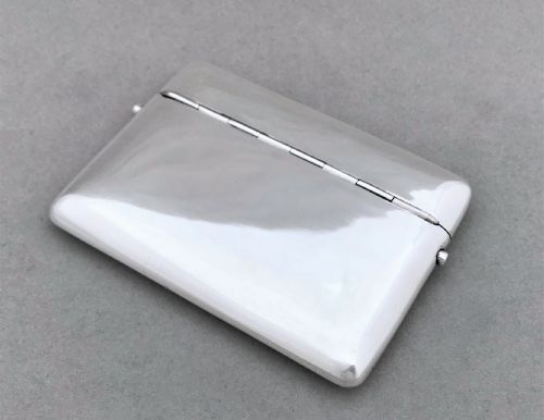 fig 1. An unusual silver sprung card or cigarette case