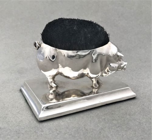 fig 1. A fantastic silver novelty pig pen wipe