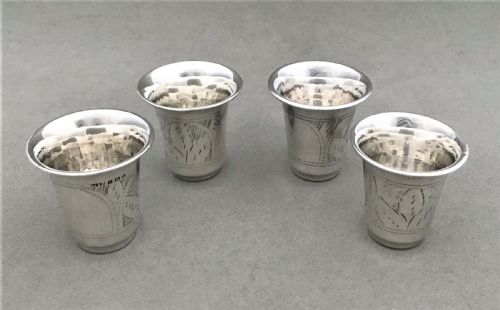 fig 1. A rare set of four hallmarked silver shot or tot cups