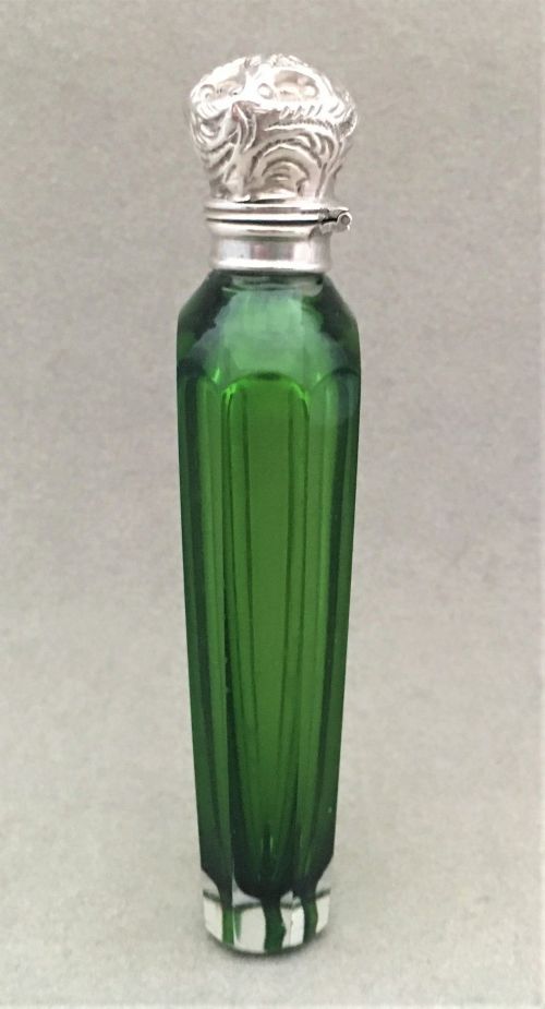 fig 1. An attractive emerald green silver mounted scent bottle