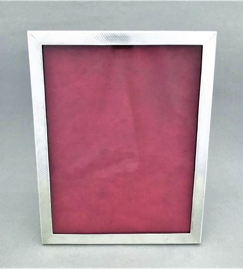 fig 1. An attractive engine turned silver photo frame