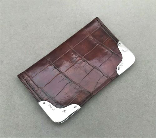 fig 1. A delightful silver mounted wallet or purse