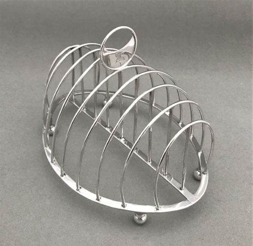 A Fabulous 18th Century Silver Toast Rack