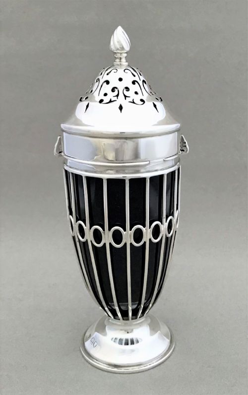 fig 1. An elegant Edwardian silver wirework sugar caster