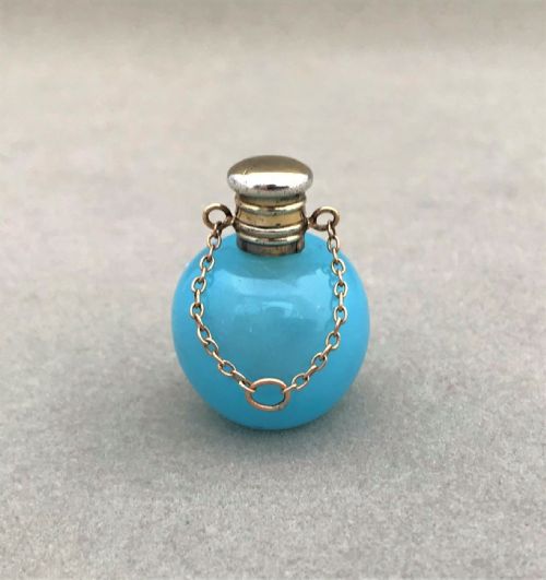 An Exquisite Silver Mounted Miniature Scent Bottle