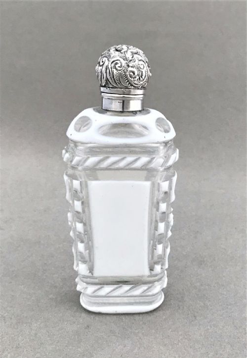 A Fabulous Silver Mounted Cut Through Scent Bottle