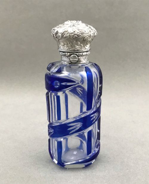 A Victorian Silver Mounted Cut Through Scent Bottle