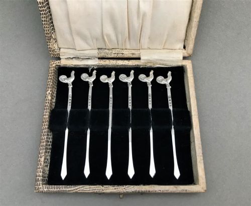 fig 1. A hallmarked set of silver cockerel cocktail sticks