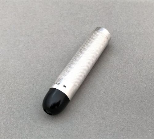 A Stylish Art Deco Silver Theatre Programme Torch