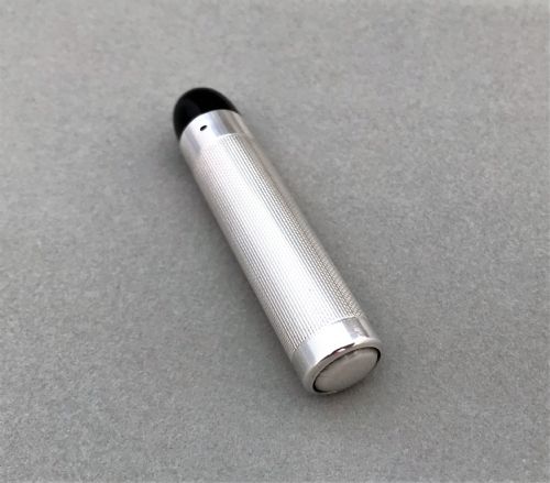 fig 1. A stylish Art Deco silver theatre programme torch