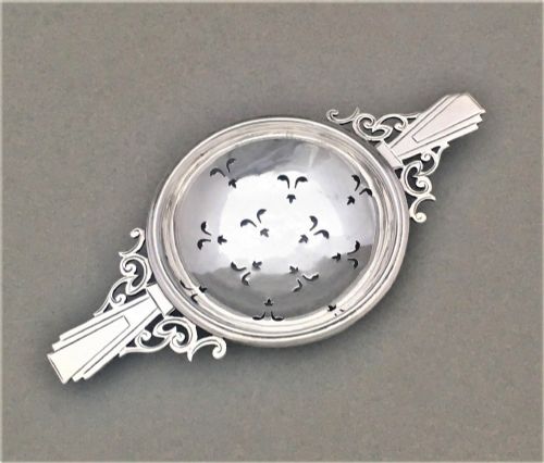 A Handsome Art Deco Silver Tea Strainer