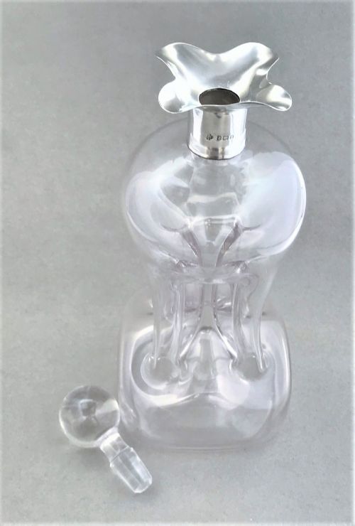fig 1. A handsome Edwardian silver mounted glug glug decanter