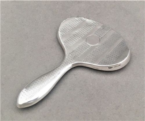 fig 1. An Art Deco silver handbag mirror