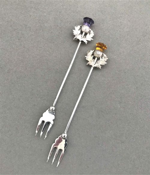A Charming Pair of Chester Silver 'Thistle' Pickle Forks