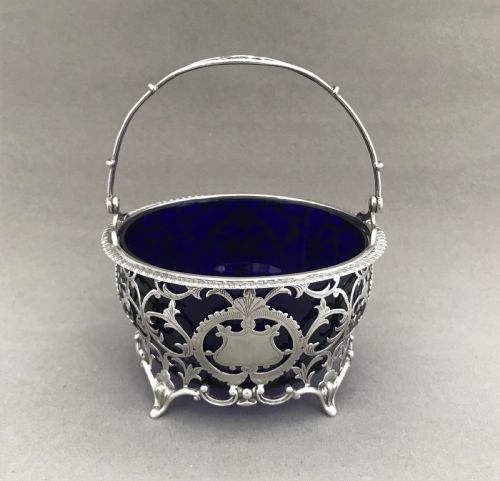 A Superb Pierced Silver Swing Handled Basket