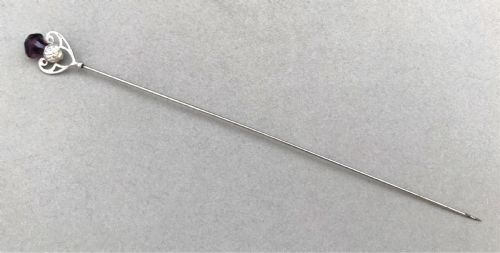 fig 1. A gorgeous silver hatpin with thistle motif terminal