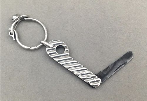 fig 1. A Victorian silver Sampson Morden cigar cutter & knife