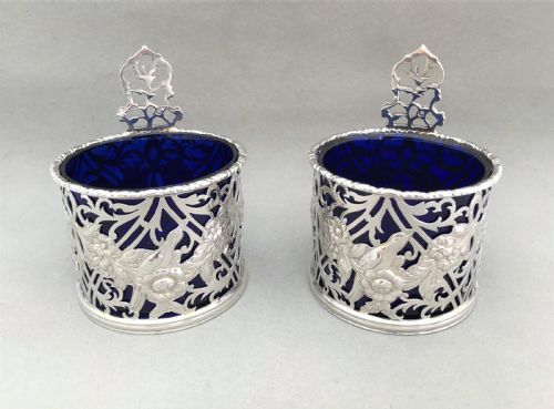 An Outstanding Pair of Pierced Silver Condiment/cream Pails